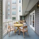 Deck with tables and view of residences